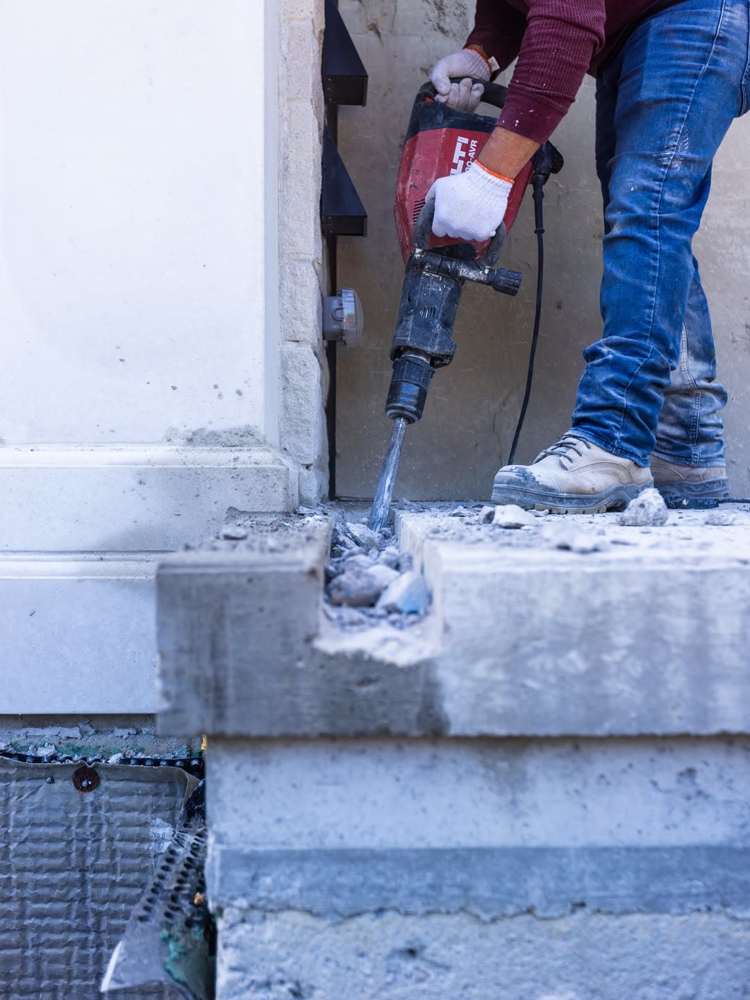 Concrete threshold demolition with Hilti jackhammer Toronto residential